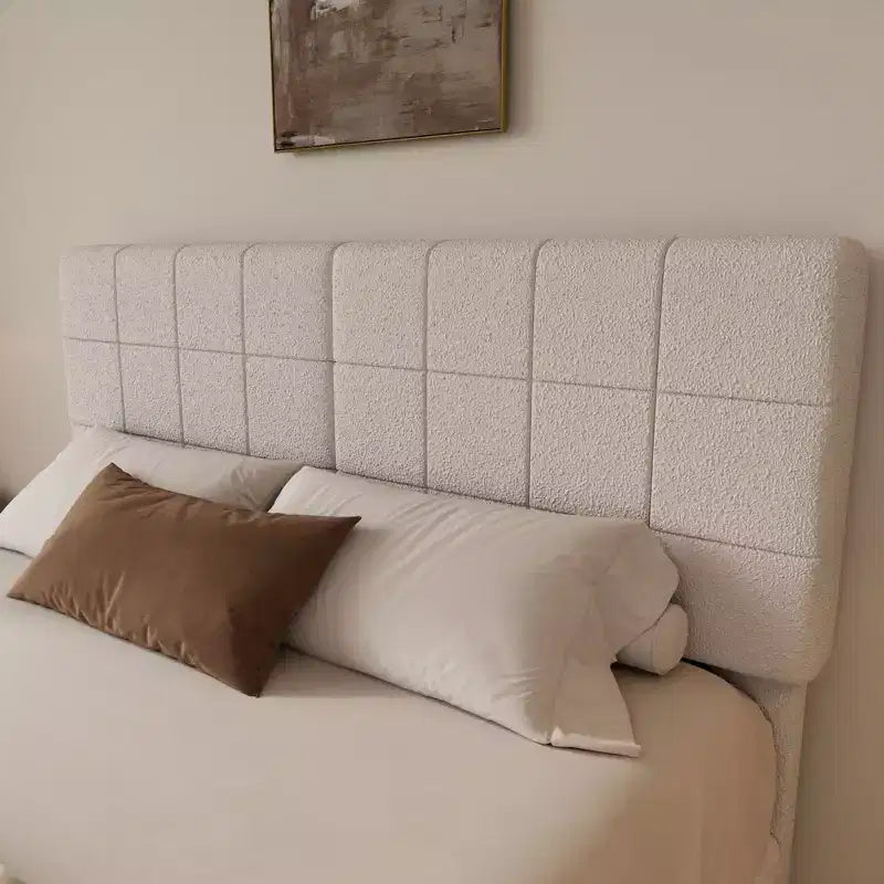 Giroletto flottante in boucle con testiera imbottita | Moderno minimalista